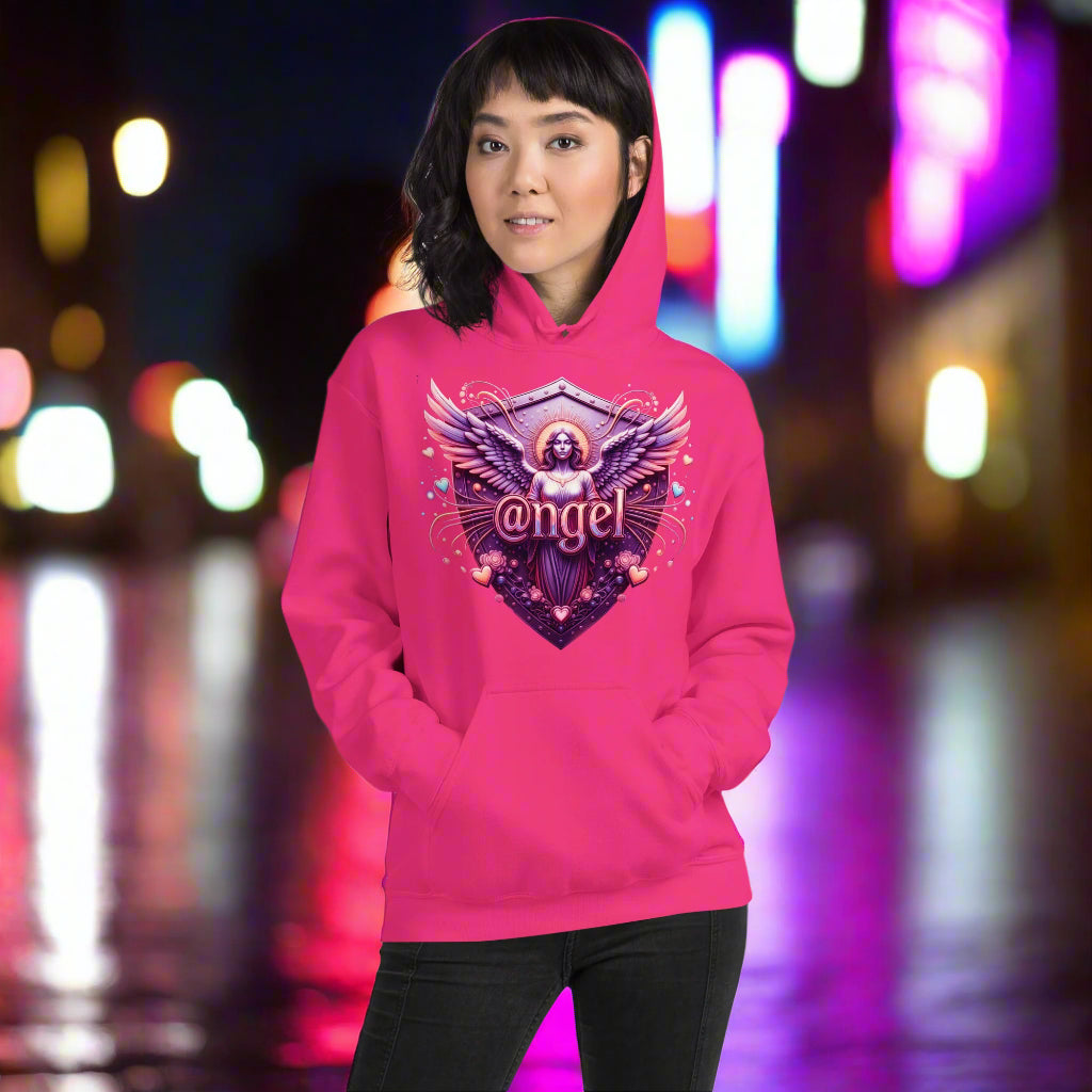 person wearing a pink hoodie with an angel design on a white background