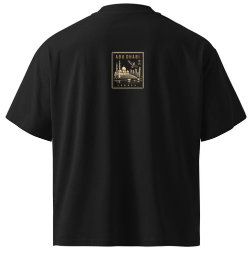 Back view of Das Hot! Abu Dhabi Desert Hype oversized black streetwear T-shirt featuring the Abu Dhabi Legacy badge inspired by Sheikh Zayed Grand Mosque, Louvre Abu Dhabi, Etihad Towers, Emirati heritage and the modern Abu Dhabi skyline.