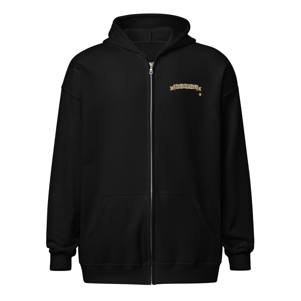 Front studio view of the premium black zip-up streetwear hoodie by Das Hot!. The image displays a straight-on torso shot emphasizing the heavy silver metal zipper track running down the center and the clean, detailed embroidery on the left chest featuring the name MACHIAVELLI contained inside a golden-aged parchment paper scroll banner layout.