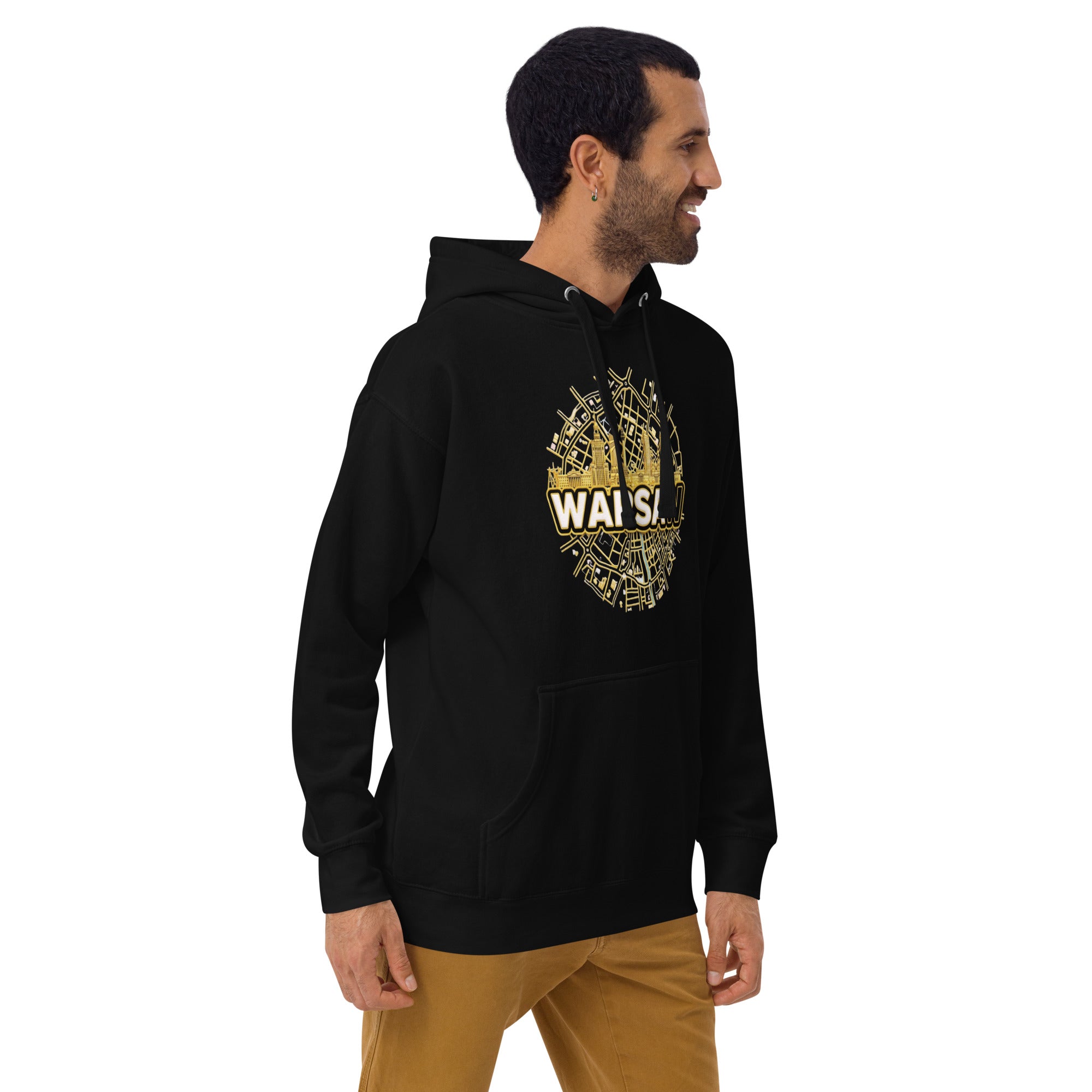 Man wearing a black hoodie with gold design and 'Warsaw' text on a white background