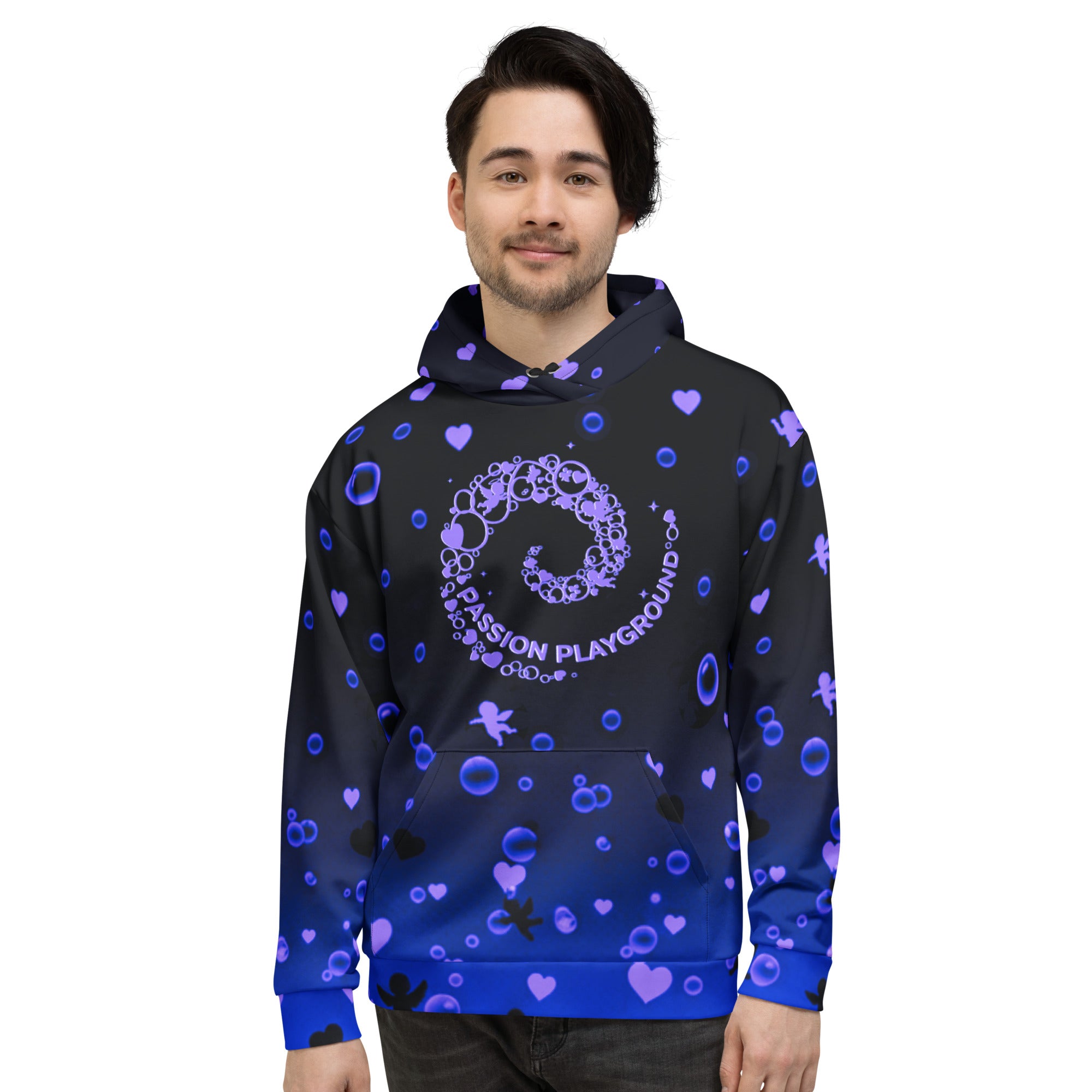 A smiling man wears a unisex Passion Playground streetwear hoodie in a front view, featuring a bubble swirl graphic on a black-to-blue gradient print.