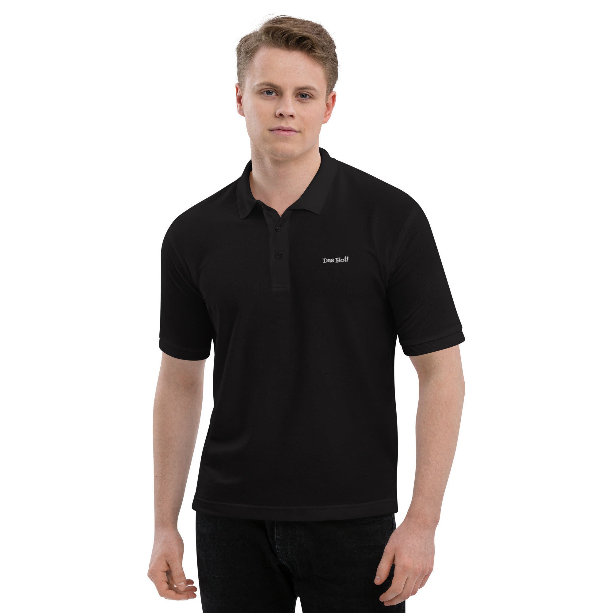 Man wearing a black polo shirt with a logo on a white background