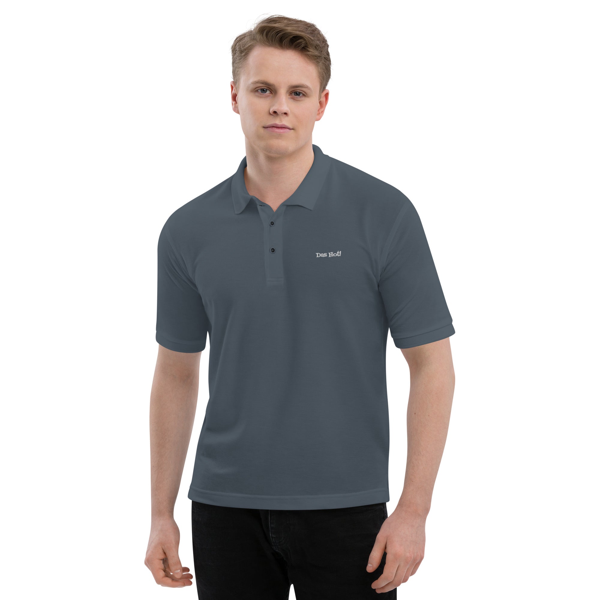 Man wearing a gray polo shirt with a brand logo on a white background