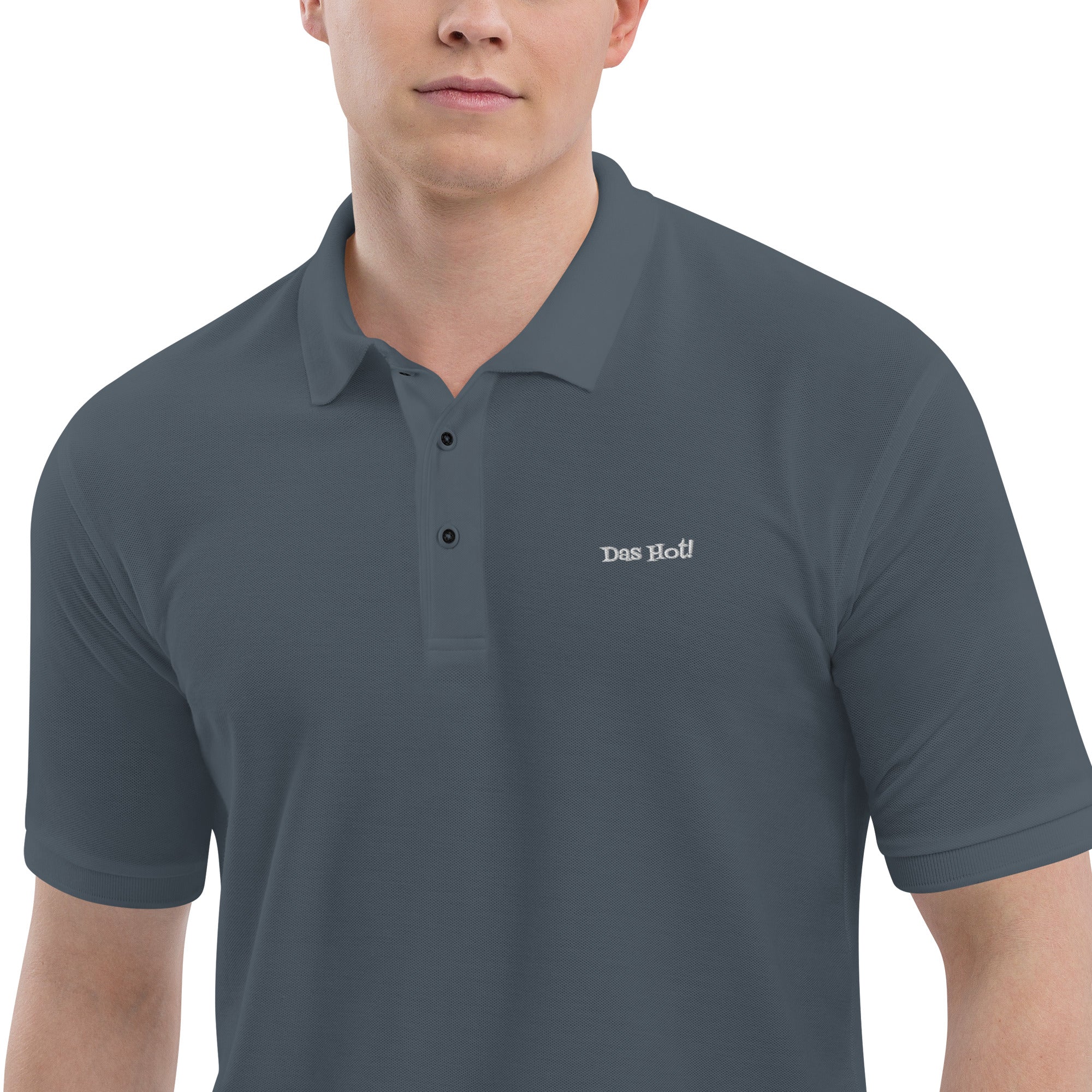 Man wearing a gray polo shirt with 'Des Hoc' logo on a white background