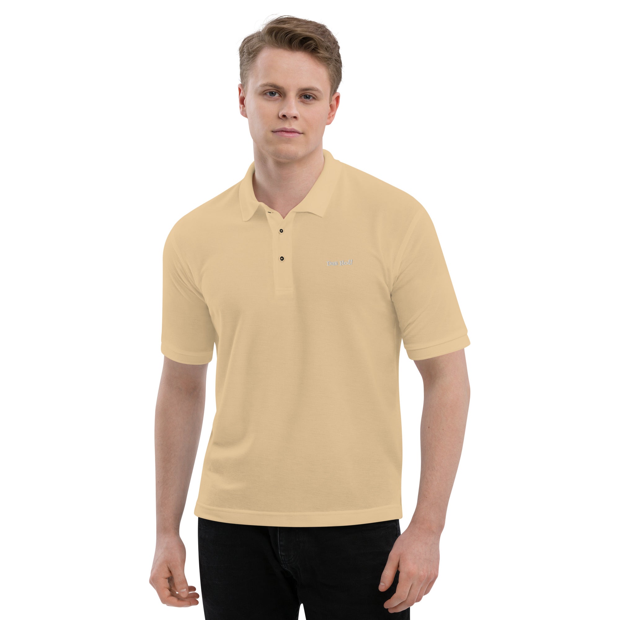 Man wearing a beige polo shirt on a white background
