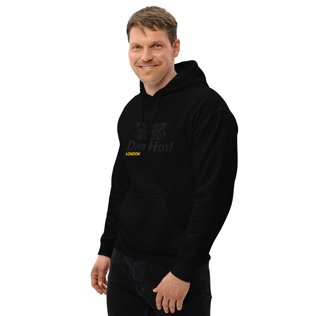 Man wearing a black London hoodie with text on a white background