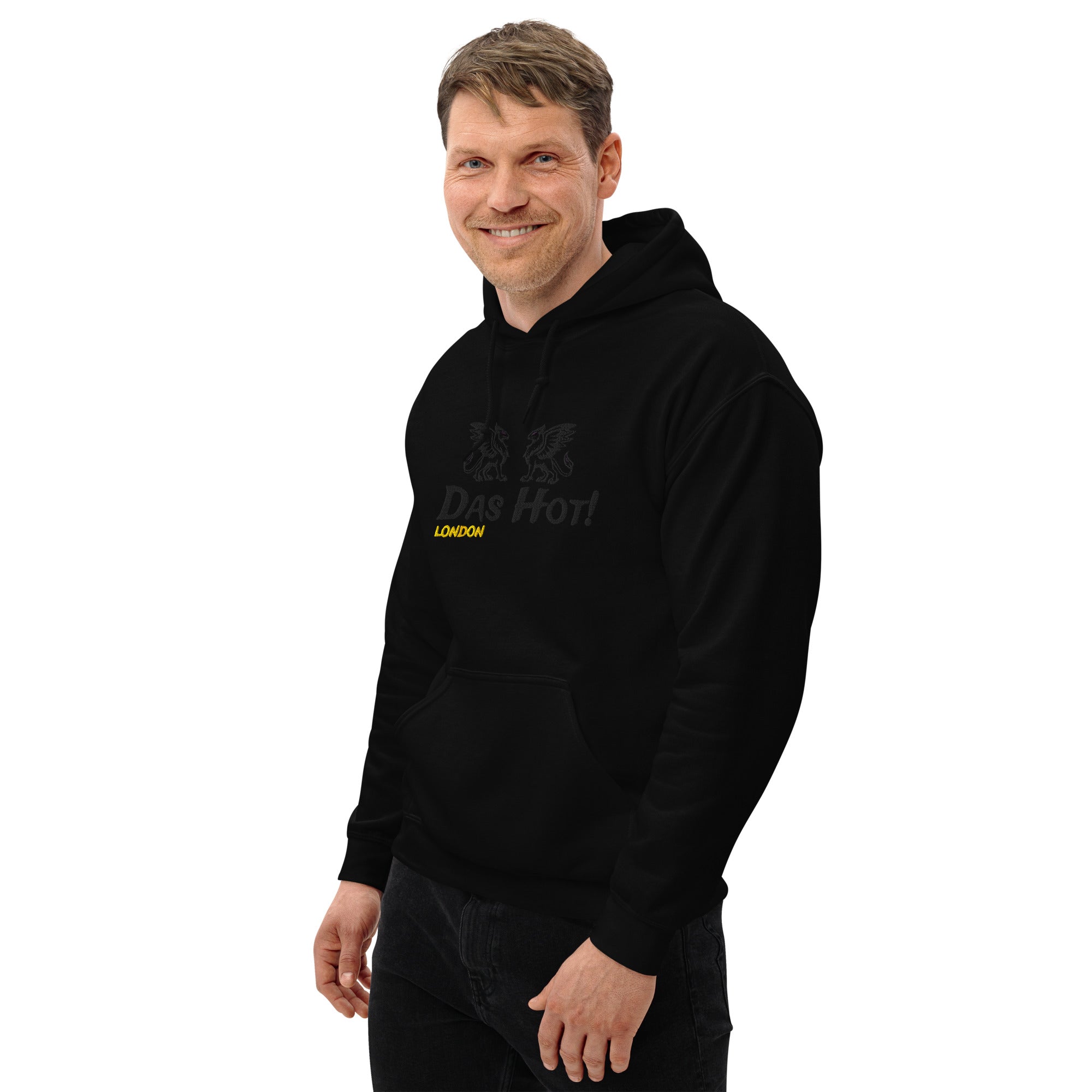 Man wearing a black London hoodie with text on a white background