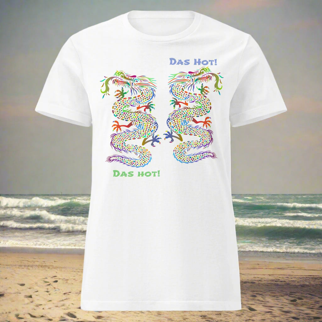 White t-shirt with colorful dragons design and "Das Hot!" text on a beach with waves background