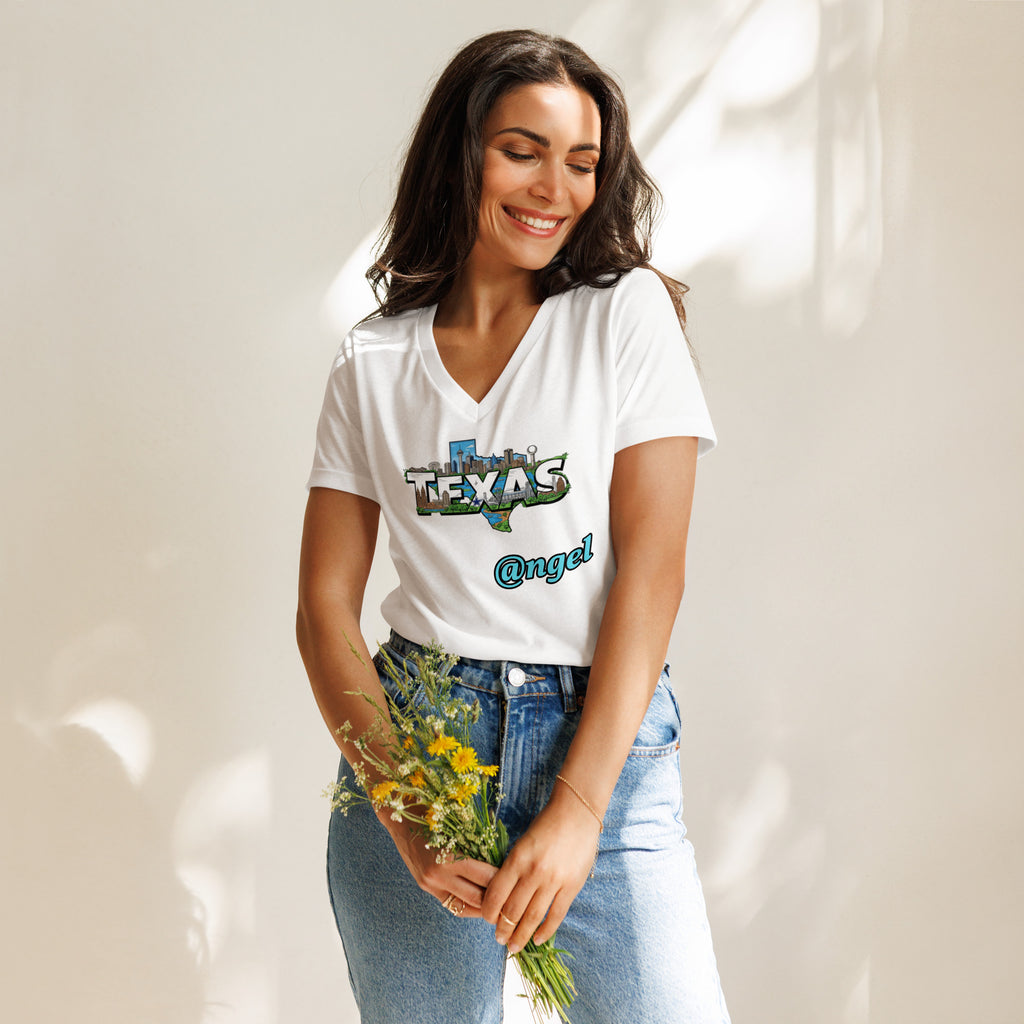 Woman wearing a white t-shirt with 'Texas Angel' text, holding flowers against a neutral background